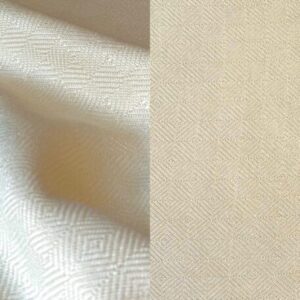 Cream dinner napkin with rich texture.