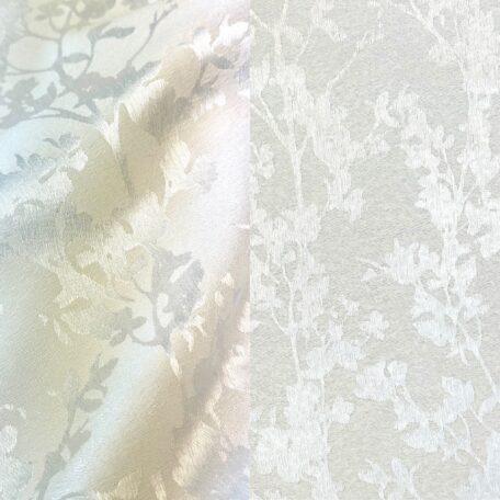 Elegant white floral tone-on-tone tablecloth.