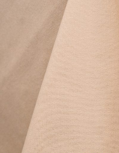 Beige cotton tablecloth and dinner napkin.