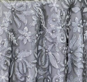 Black white and silver sequin sheer floral print tablecloth.