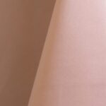 Blush pink polyester tablecloth, runner, sash, and dinner napkin.