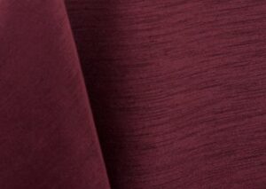 Burgundy majestic dupioni tablecloth, runner, sash, and dinner napkin.