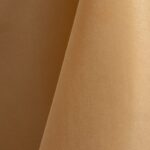 Tan polyester tablecloth, runner, sash, and dinner napkin.