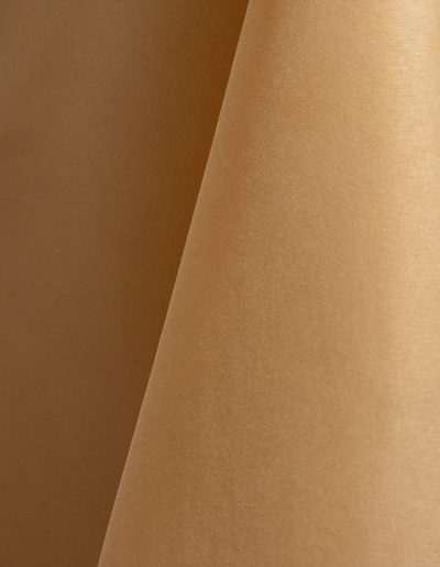 Tan polyester tablecloth, runner, sash, and dinner napkin.