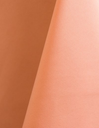 Coral polyester tablecloth, runner, sash, and dinner napkin.