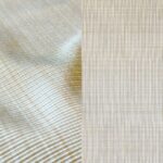 Elegant cream dinner napkin and cocktail napkin.