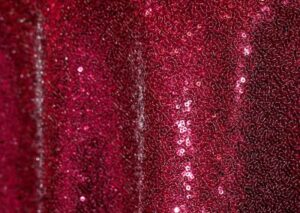 Glitzy dark red sequin tablecloth and runner.