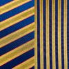 Navy blue and gold stripe tablecloth and runner.