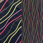 Black, pink, green, and yellow wave pattern tablecloth and runner.