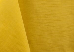 Lemon yellow majestic dupioni tablecloth, runner, sash, and dinner napkin.