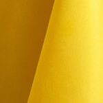Lemon yellow polyester tablecloth, runner, sash, and dinner napkin.
