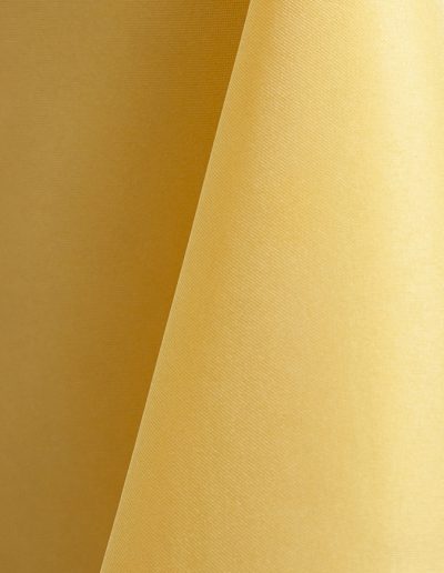 Pale yellow polyester tablecloth, runner, sash, and dinner napkin.