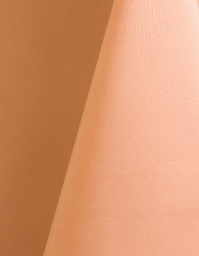 Peach polyester tablecloth, runner, sash, and dinner napkin.