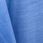 Periwinkle blue majestic dupioni tablecloth, runner, sash, and dinner napkin.