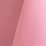 Bright pink polyester tablecloth, runner, sash, and dinner napkin.