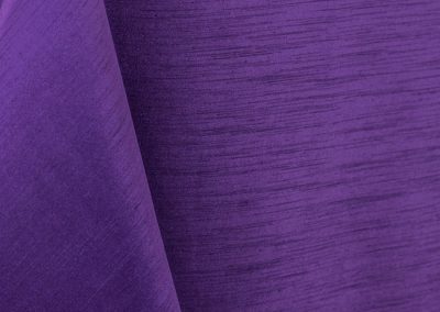 Purple majestic dupioni tablecloth, runner, sash, and dinner napkin.