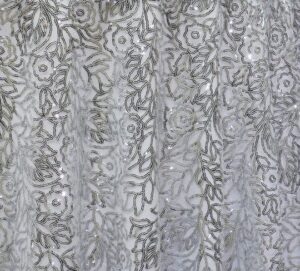 Silver sequin leaf print sheer tablecloth and runner.