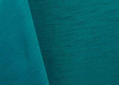 Turquoise blue majestic dupioni tablecloth, runner, sash, and dinner napkin.